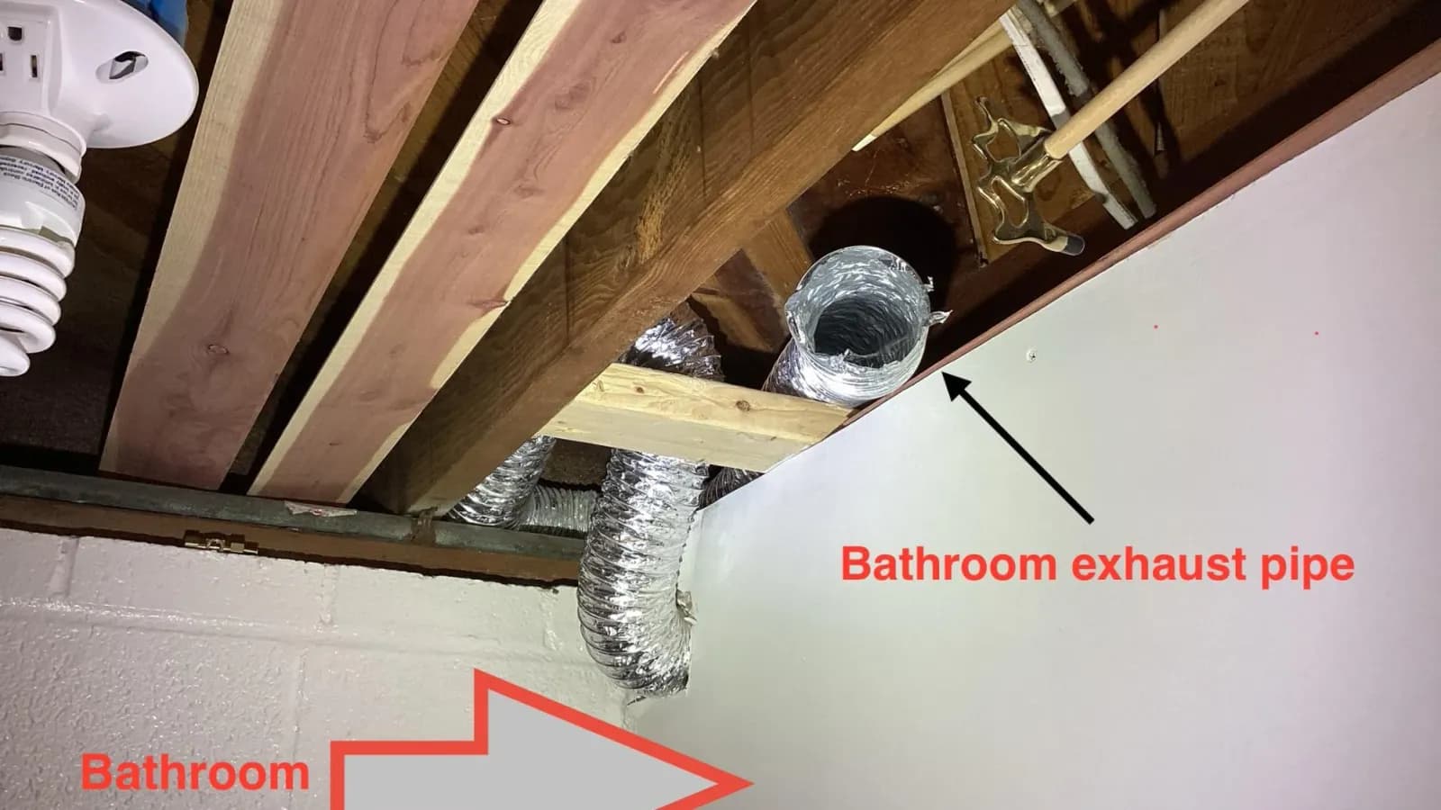 Arrow pointing to bathroom exhaust vent location