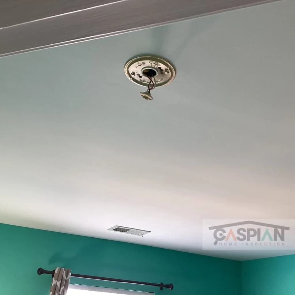 Fire sprinkler head installed on ceiling